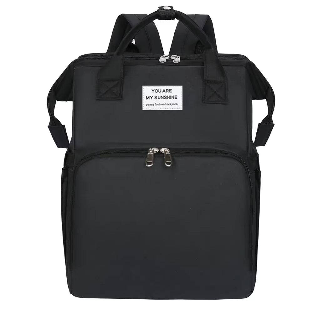 DreamNest Travel Crib & Tote