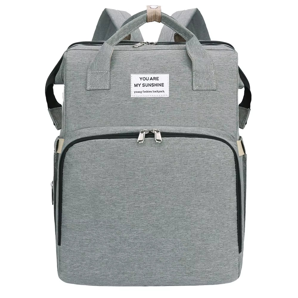 DreamNest Travel Crib & Tote